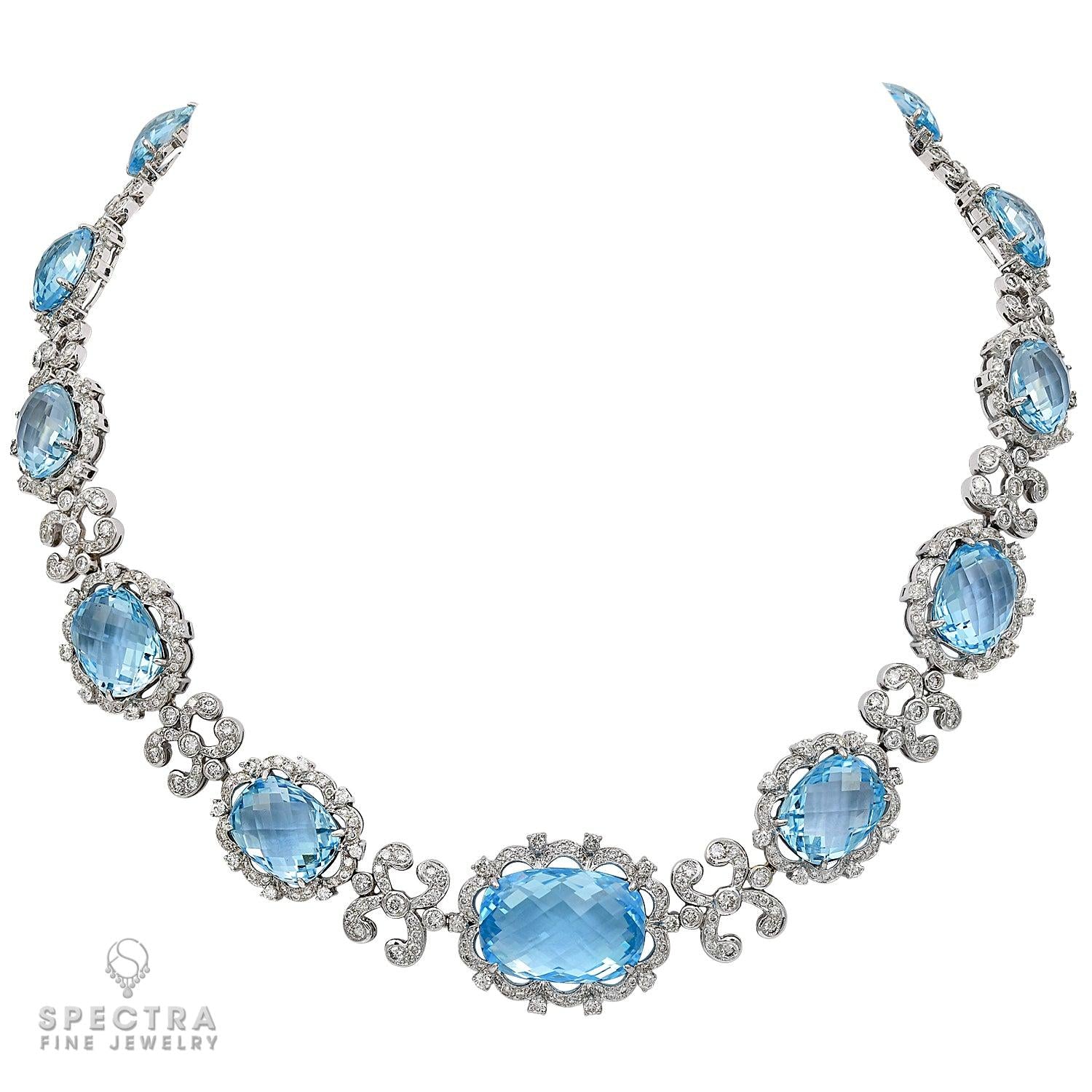 18kt White Gold Blue Topaz and Diamond Graduated Necklace
