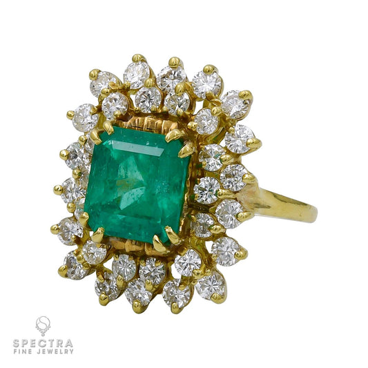 18kt Yellow Gold Ring with 5.00ct Emerald and Two-Tiers of Diamonds