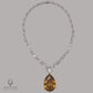Spectra Fine Jewelry Presents: The Enchanting Majesty of the Fancy Color Diamond Platinum Drop Necklace