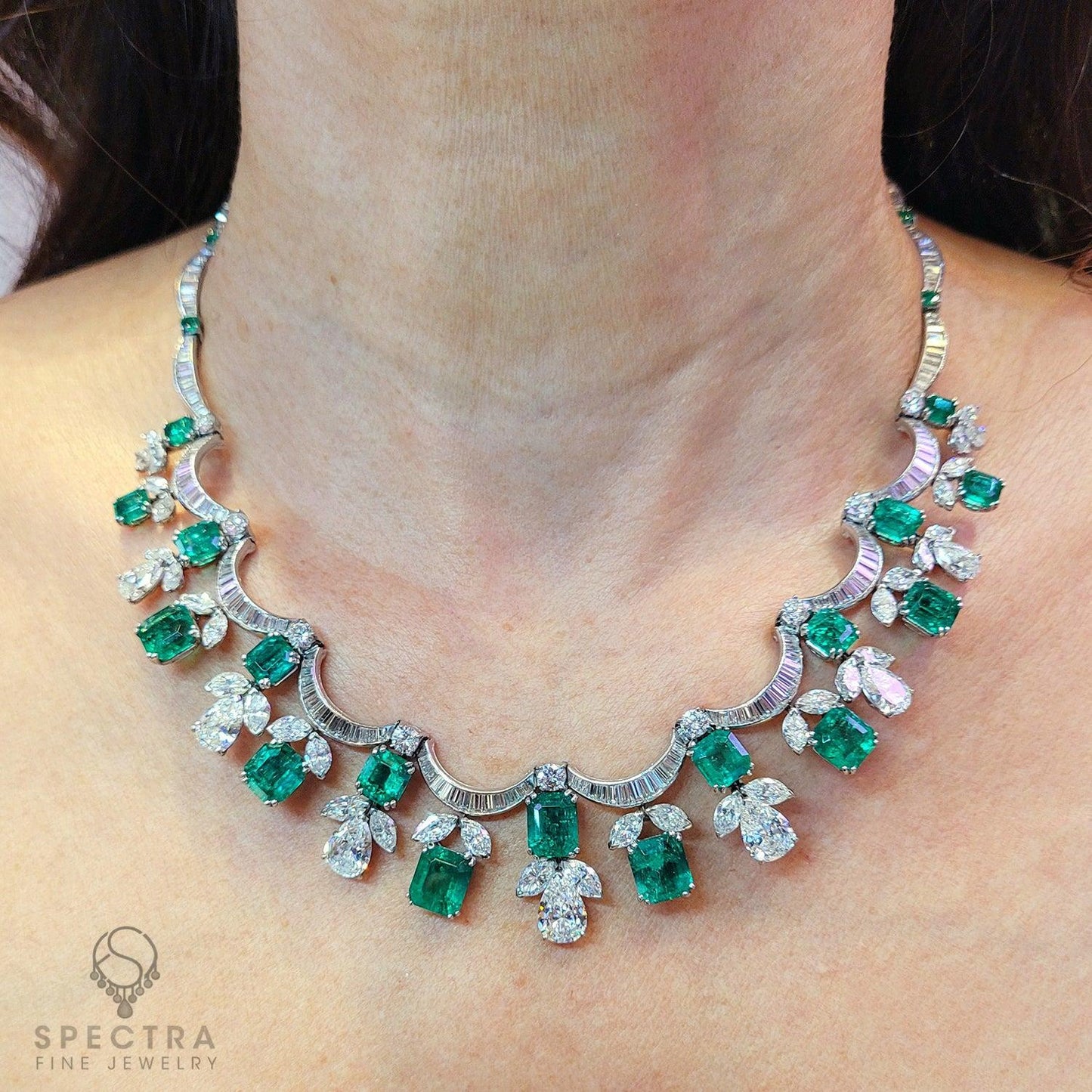 The Contemporary Splendor of the 26 cts. Emerald Fringe Bib Necklace