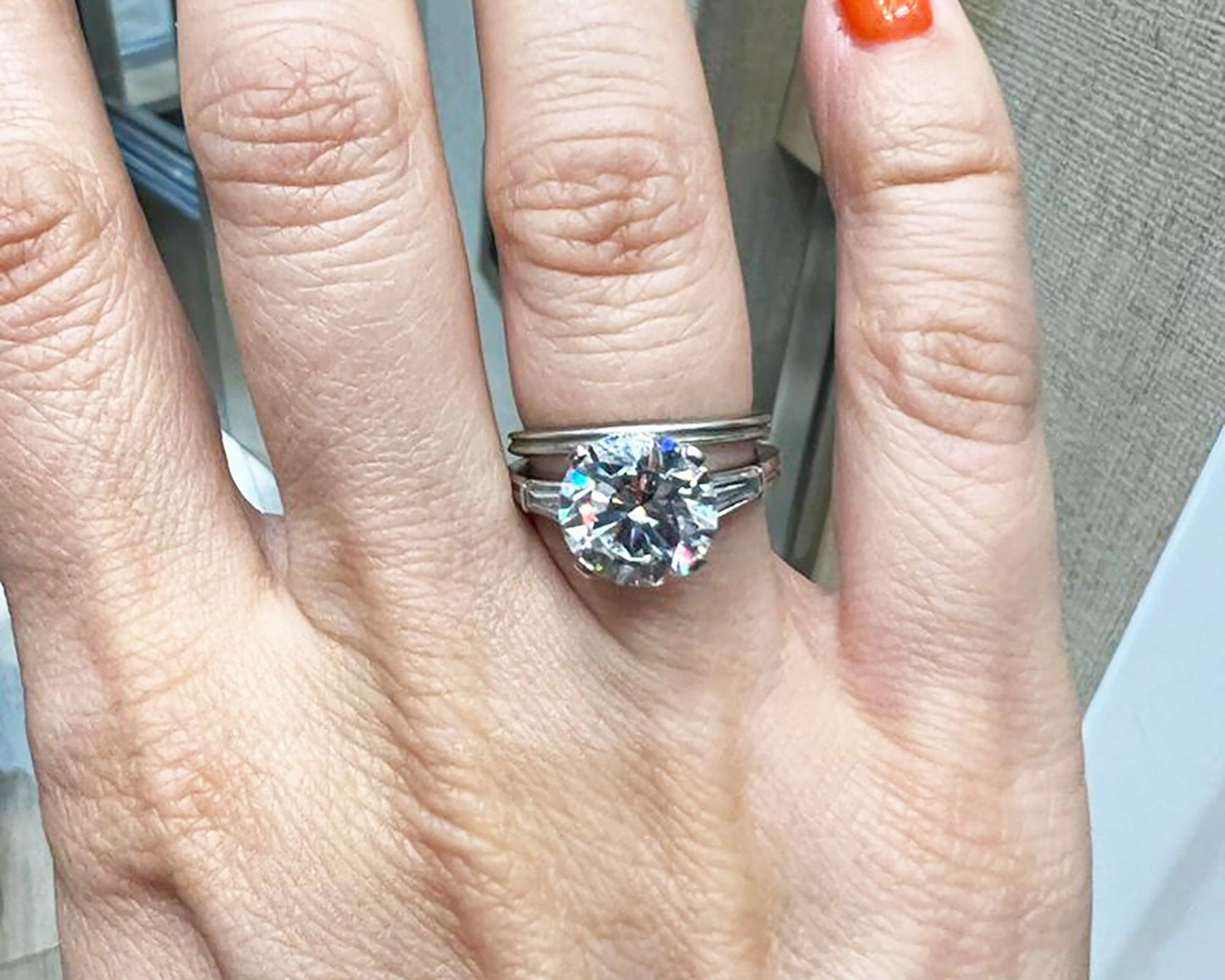 The Tiffany Three Stone Engagement Ring with Baguette Side Stones and Wedding Ba