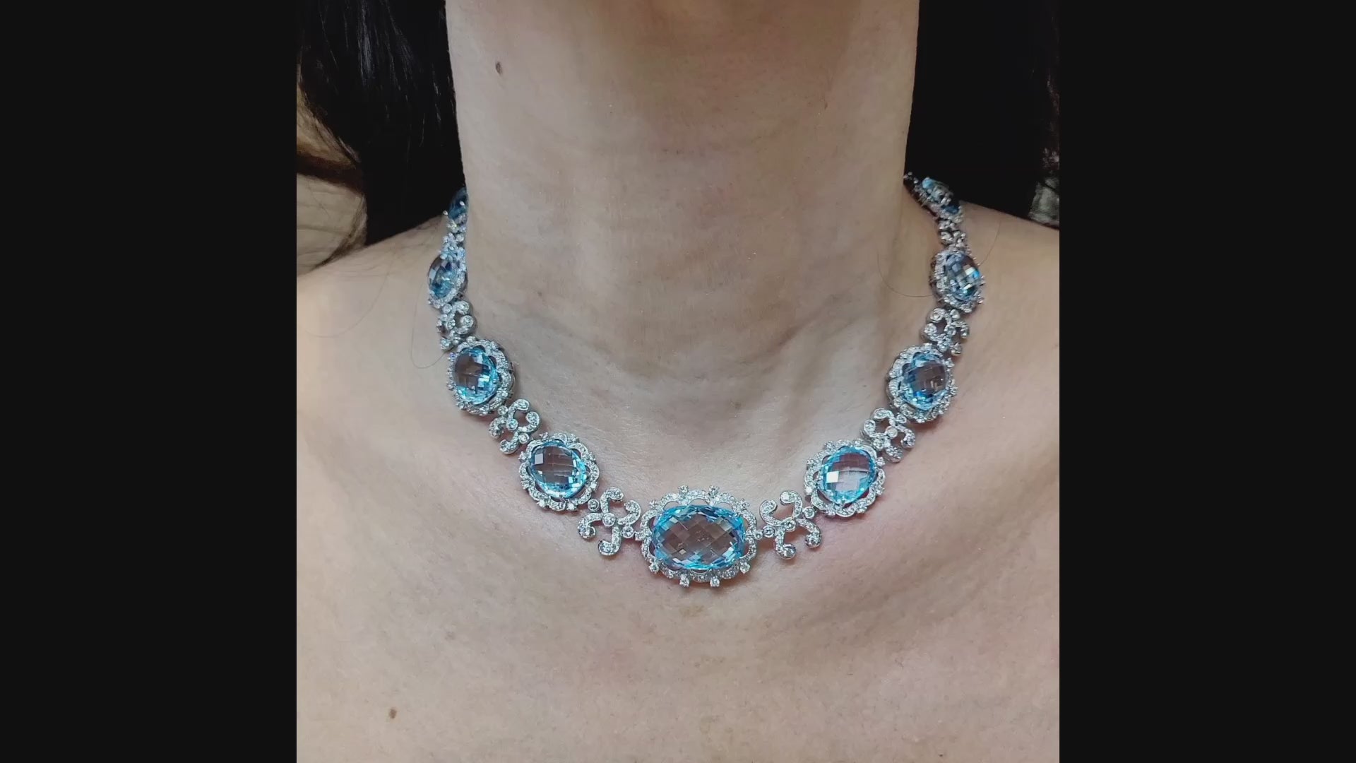 18kt White Gold Blue Topaz and Diamond Graduated Necklace