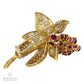 18K Yellow Gold, Ruby, and Diamond Brooch: A Timeless Treasure of Elegance and O