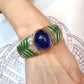 Bulgari 89.72 ct Sapphire, Emerald & Diamond Bangle in 18K Gold