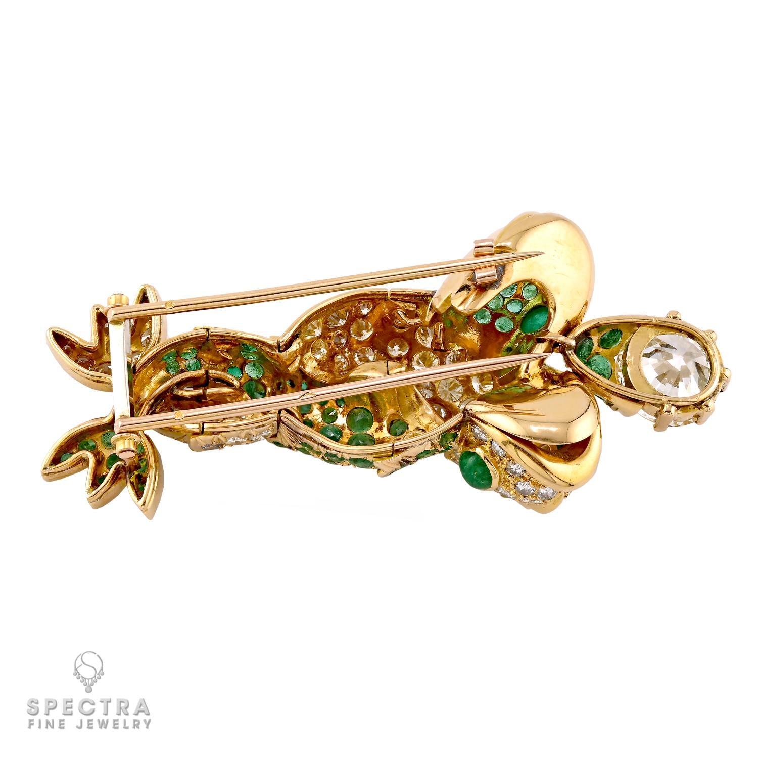 'Deux Dauphins' Diamond and Emerald Gold Brooch by Boivin