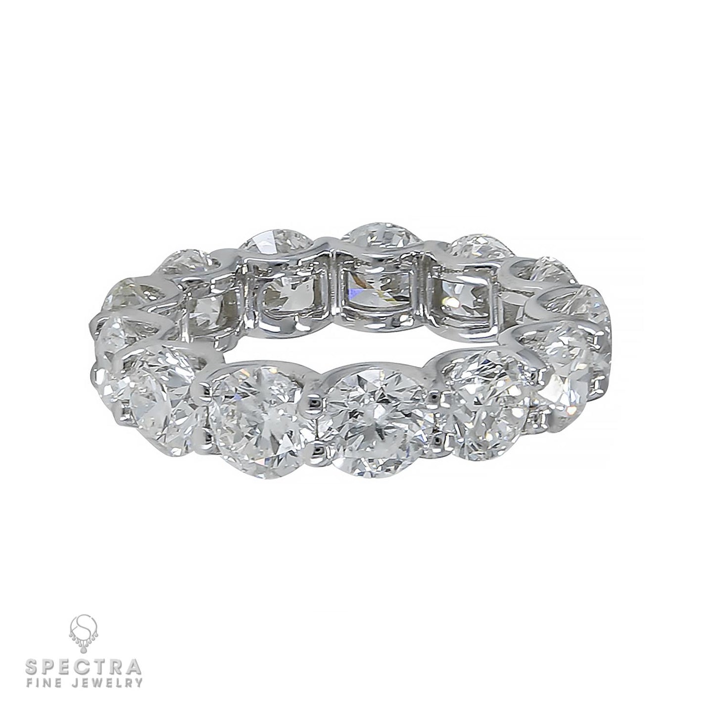 Spectra Fine Jewelry Platinum Wedding Band with 6.06 Carats of Radiant Diamonds