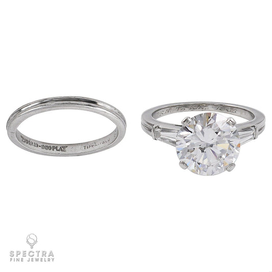The Tiffany Three Stone Engagement Ring with Baguette Side Stones and Wedding Ba