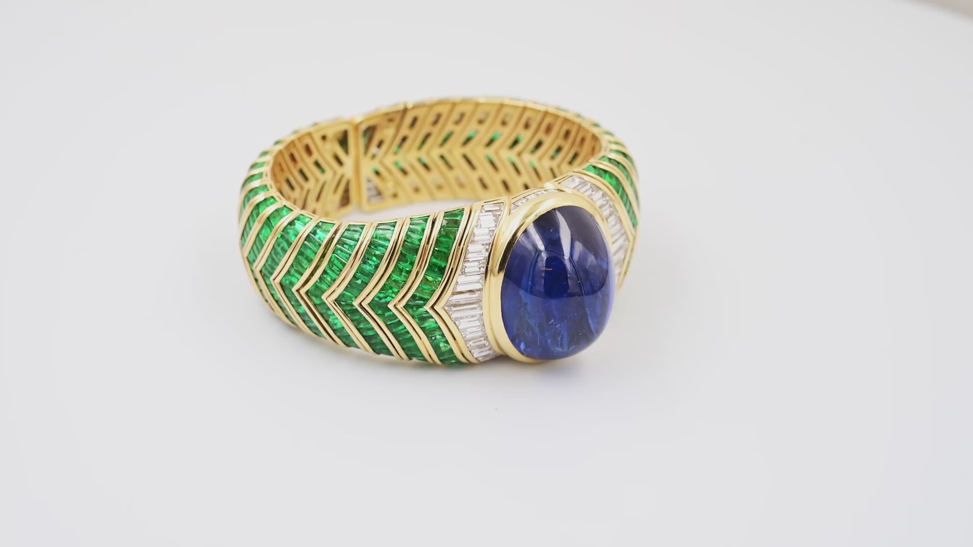 Bulgari 89.72 ct Sapphire, Emerald & Diamond Bangle in 18K Gold